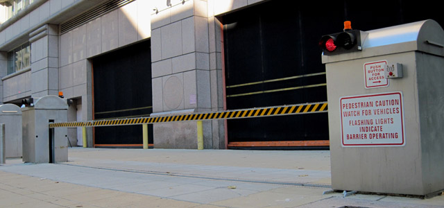 Global GRAB's Innovo Horizontal Beam Barrier installed in front of a building entrance